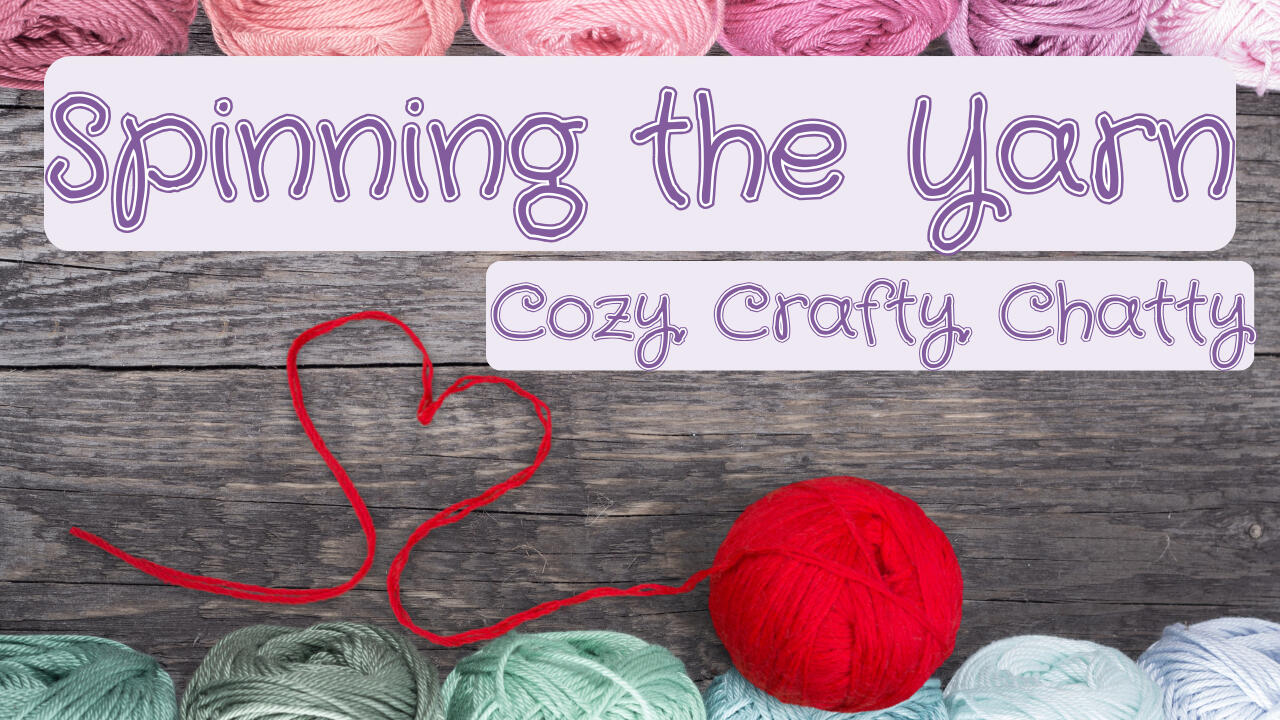 Spinning the Yarn title card featuring tagline "cozy, crafty, chatty" and a ball of red yarn with a tail forming a heart shape